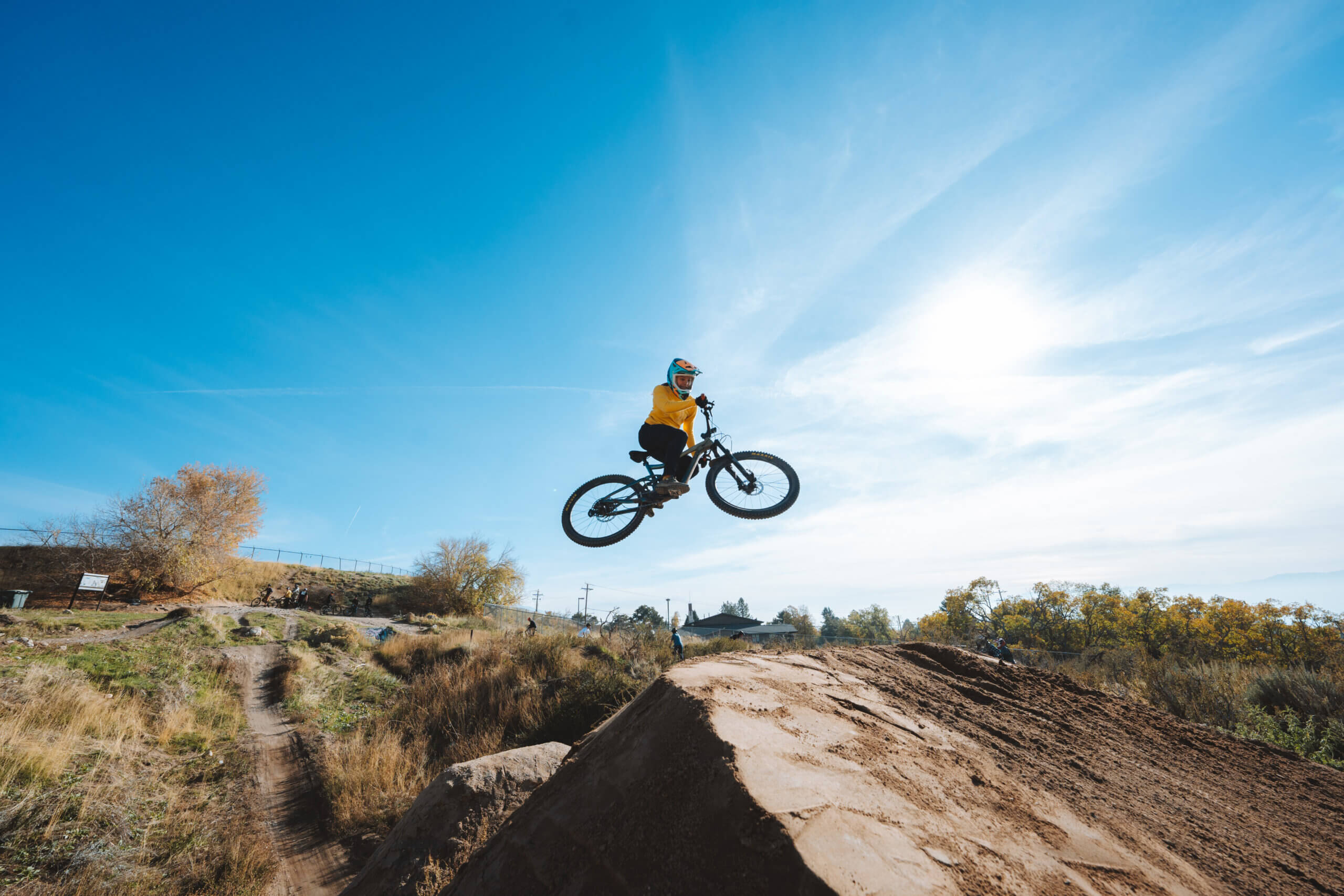 AJ Cutler being cool AF on her mountain bike.