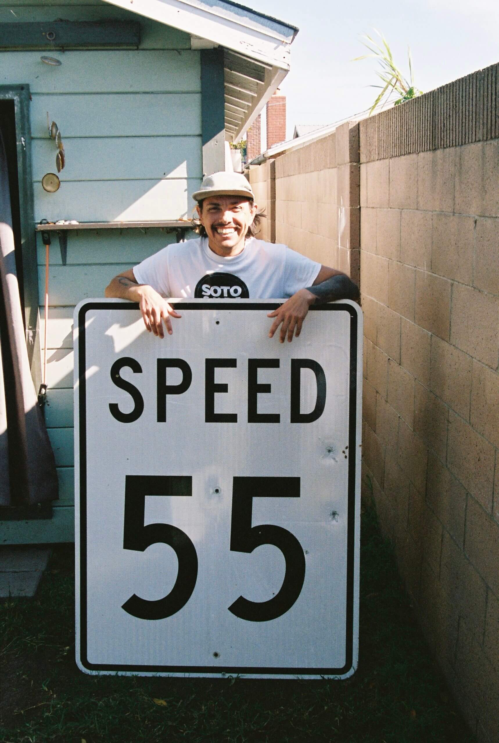 Ben Soto with his Speed 55 sign.